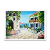DesignArt 'Цвеќиња на цветање со бели куќи со близу морето' Наутички и крајбрежен врамен уметнички принт